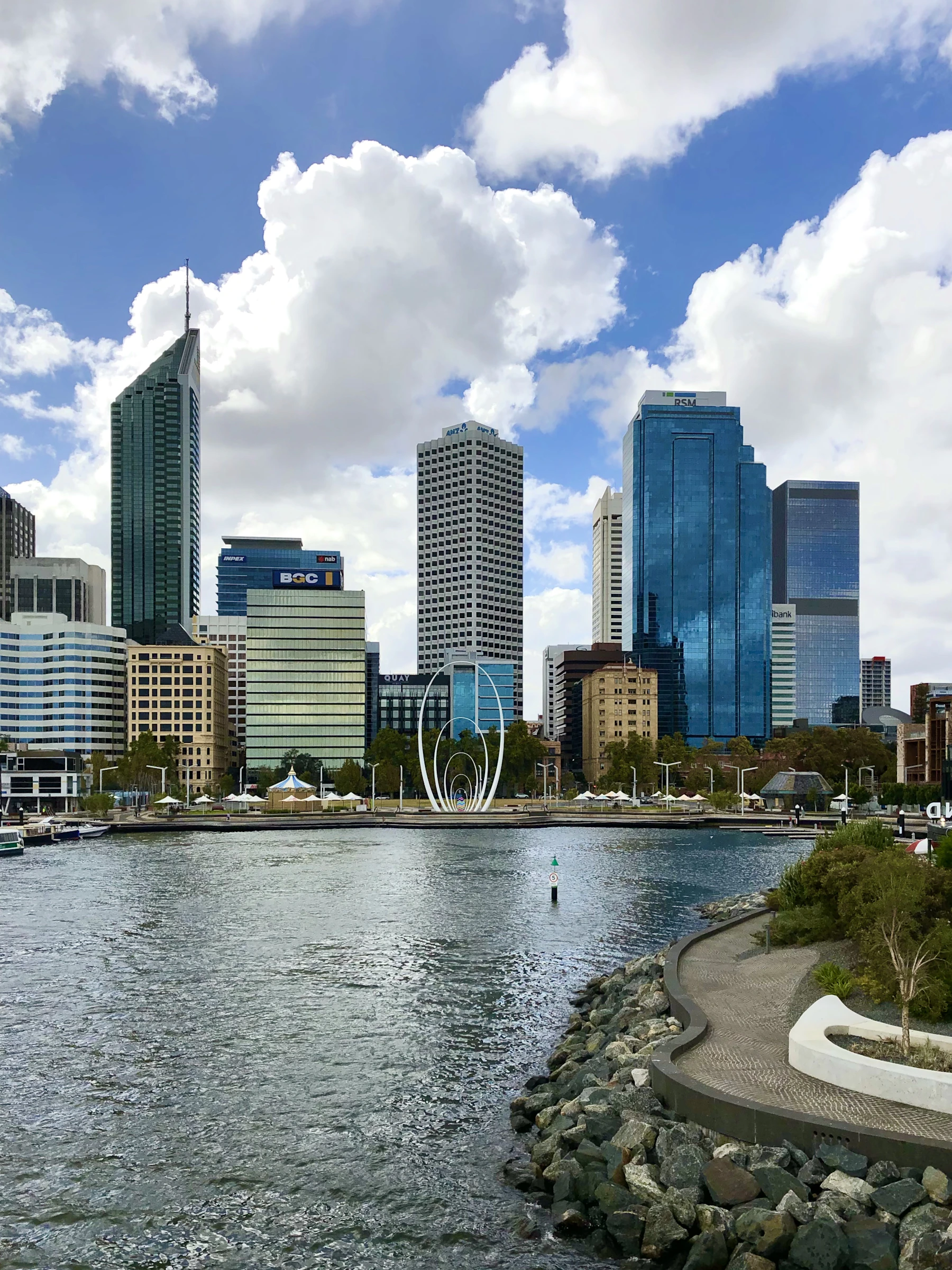 Perth skyline and Elizabeth Quay beneath a bright blue sky