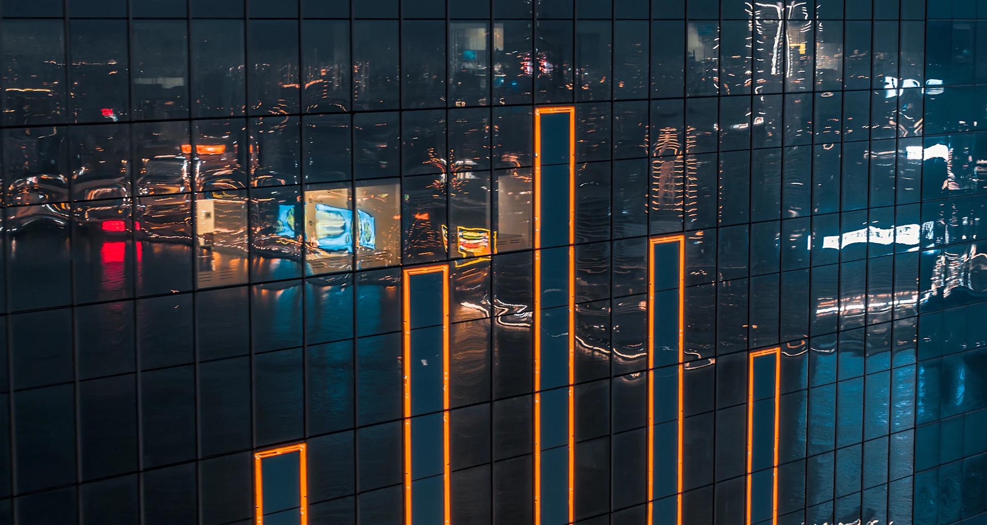 reflection of city buildings on water