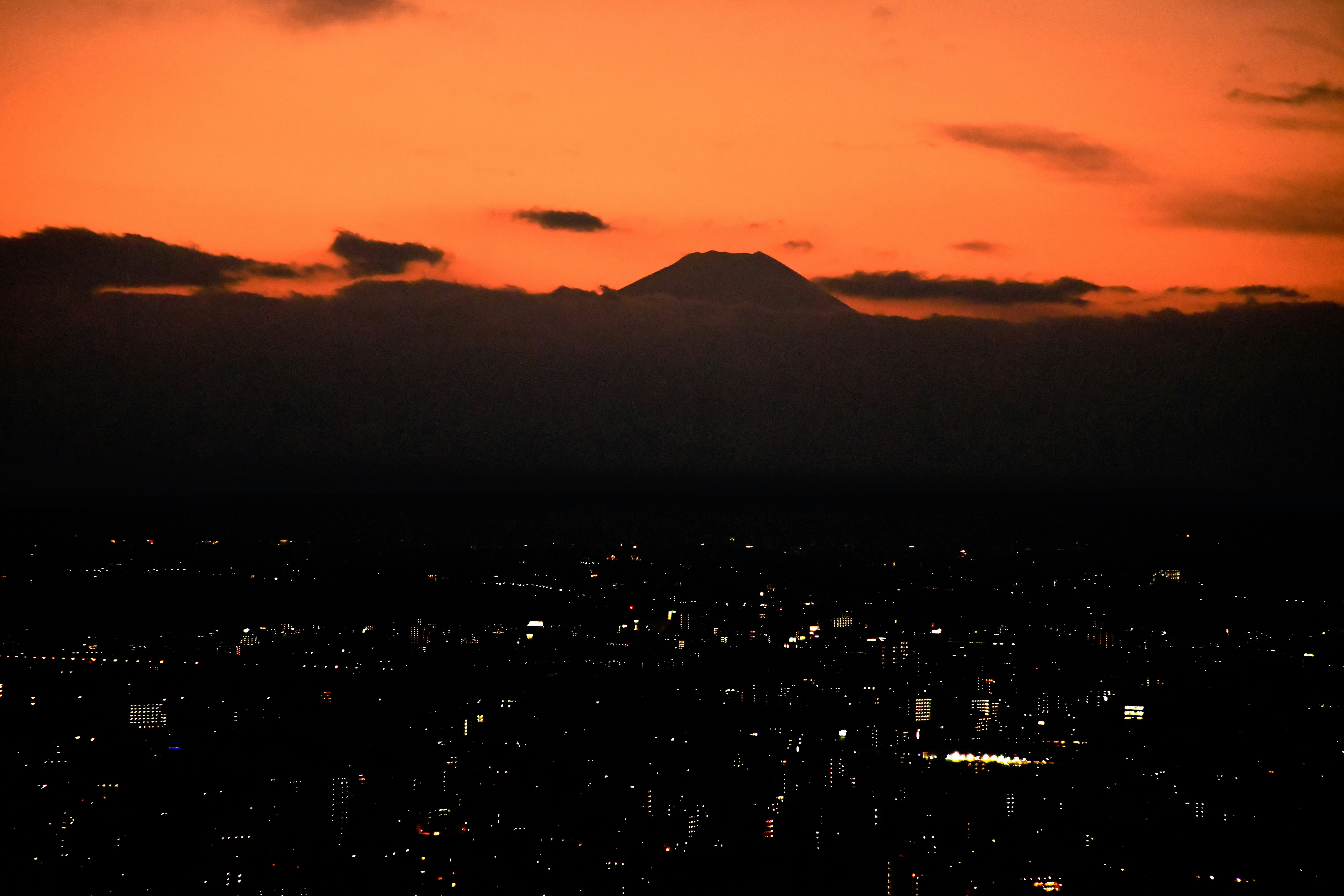 silhouette of mountain during sunset