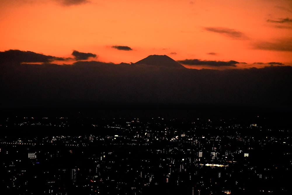 silhouette of mountain during sunset