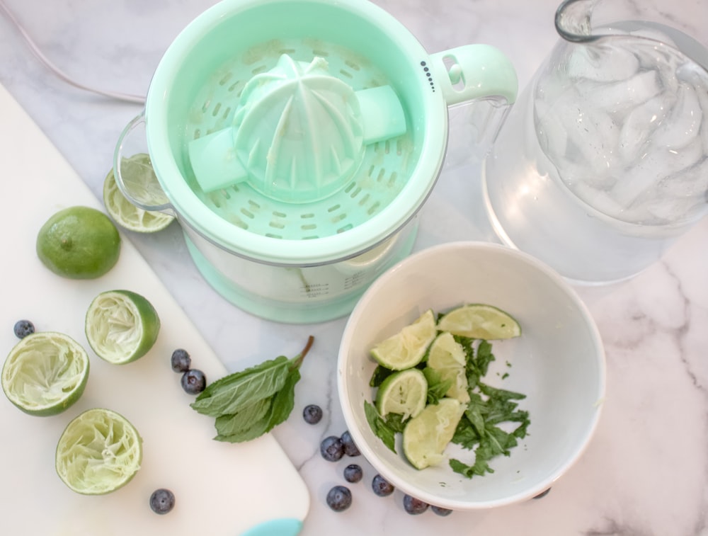 green vegetable in white plastic container