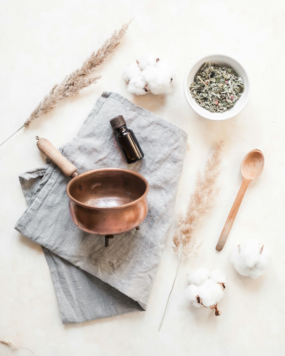 white powder on brown wooden spoon