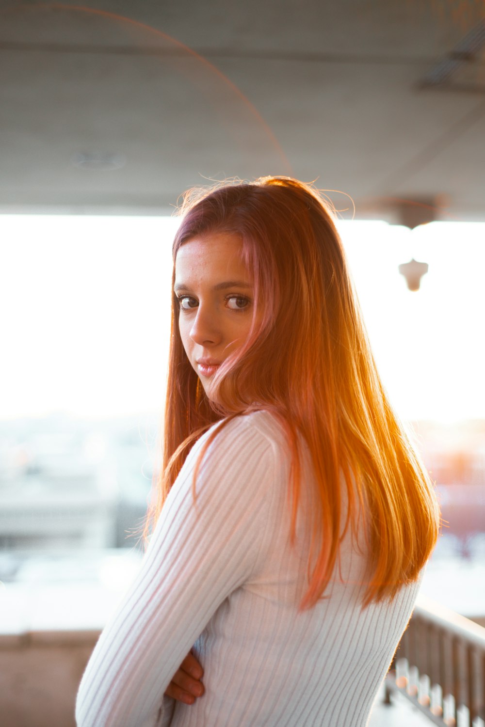 woman in white long sleeve shirt