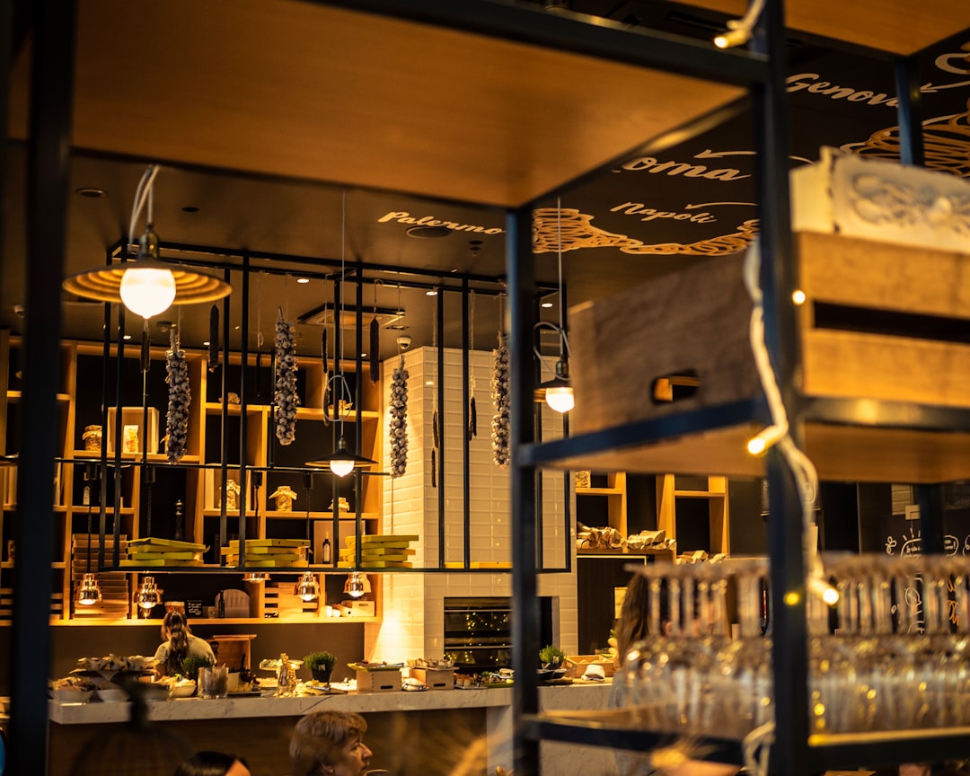 clear glass pendant lamps turned on in restaurant