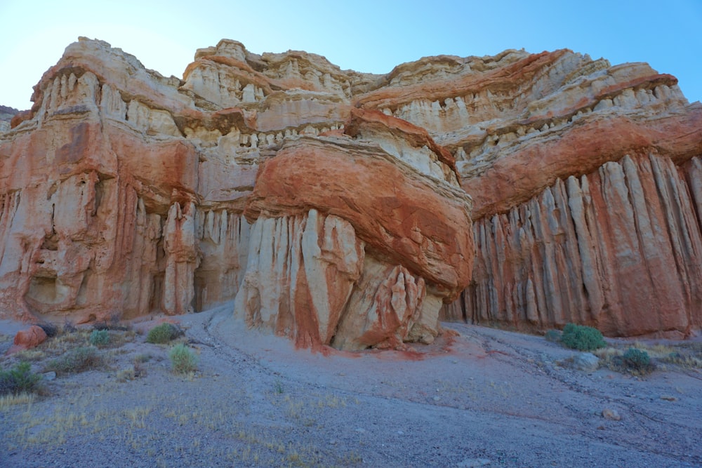 brown rock formation under blue sky during daytime