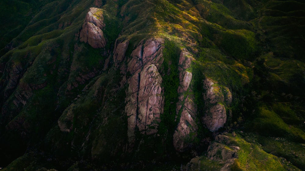 green and gray rock formation