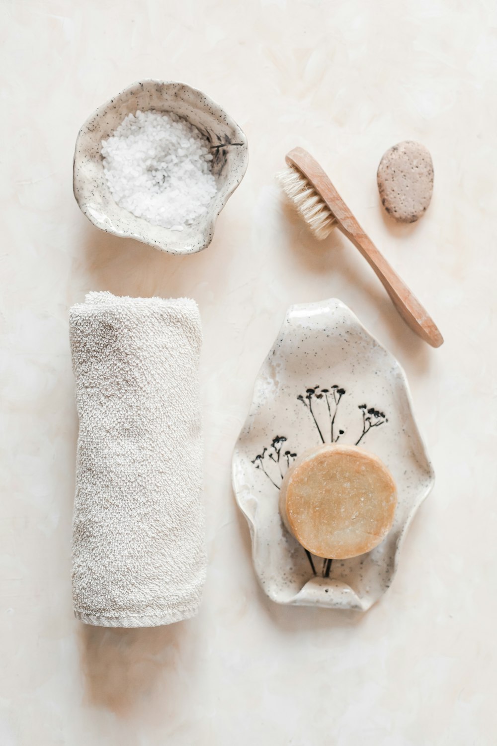 white and brown wooden rolling pin