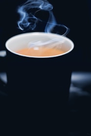 A steaming cup of freshly brewed organic coffee.