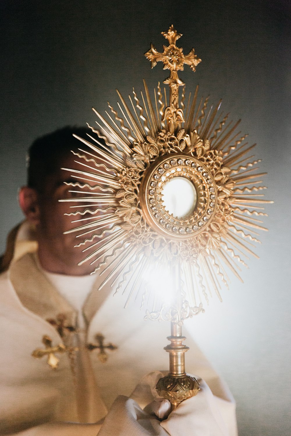 gold and silver round chandelier