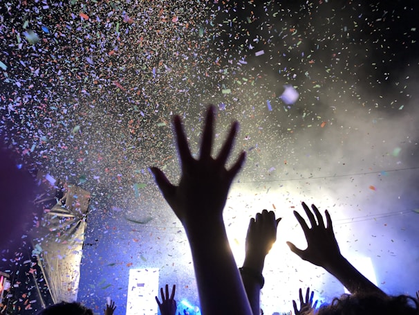 A vibrant scene showing diverse creators and agents interacting during a live streaming session with animated virtual gifts floating around.