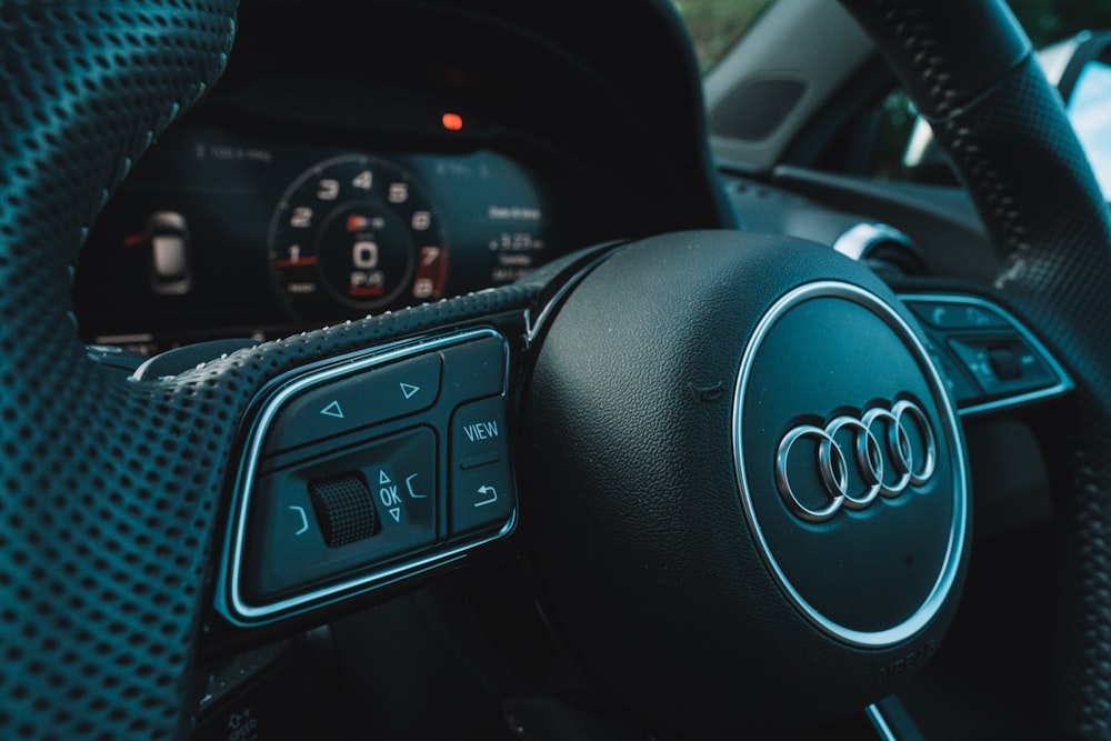 black and gray audi steering wheel