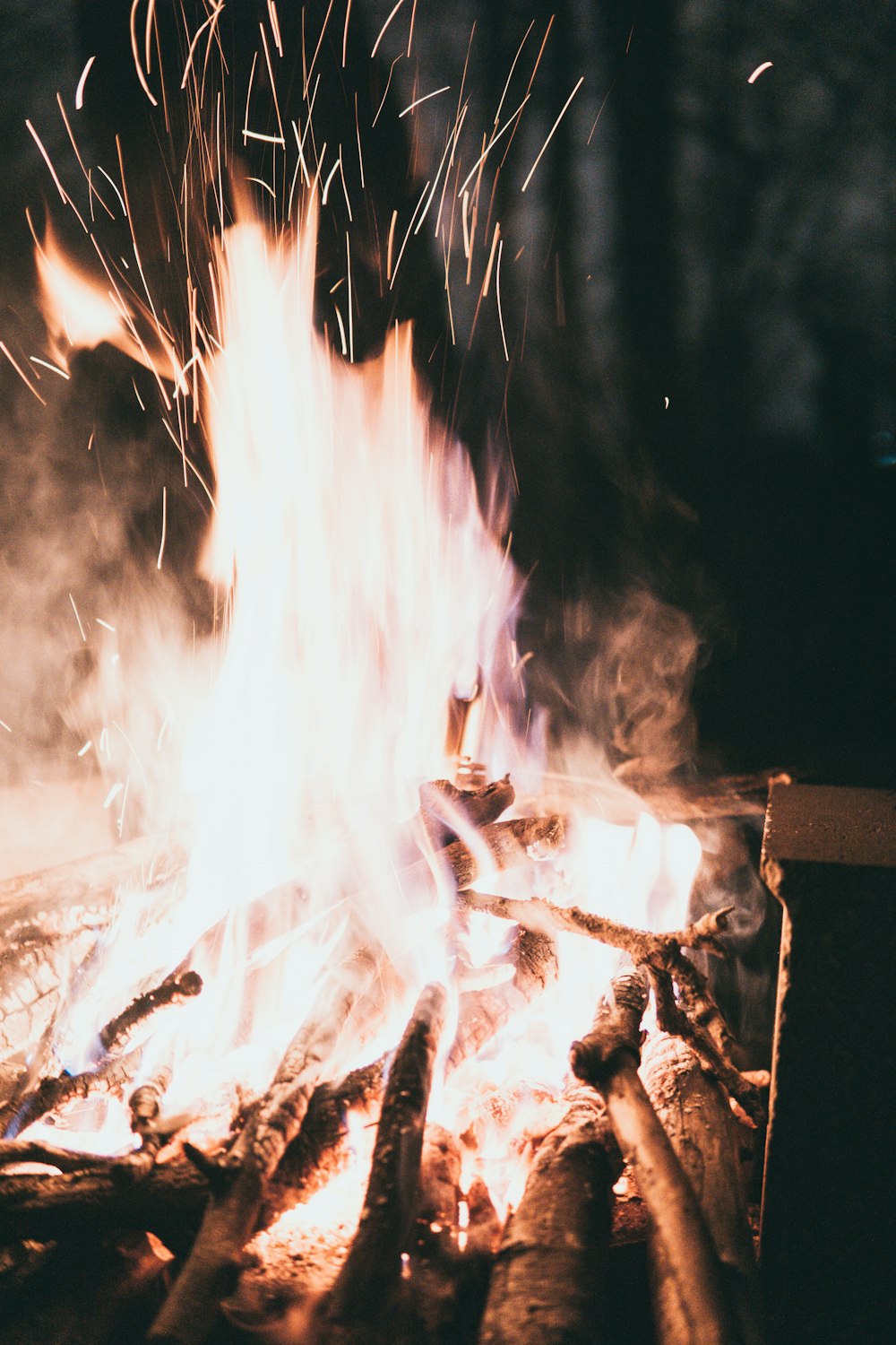 burning wood during night time