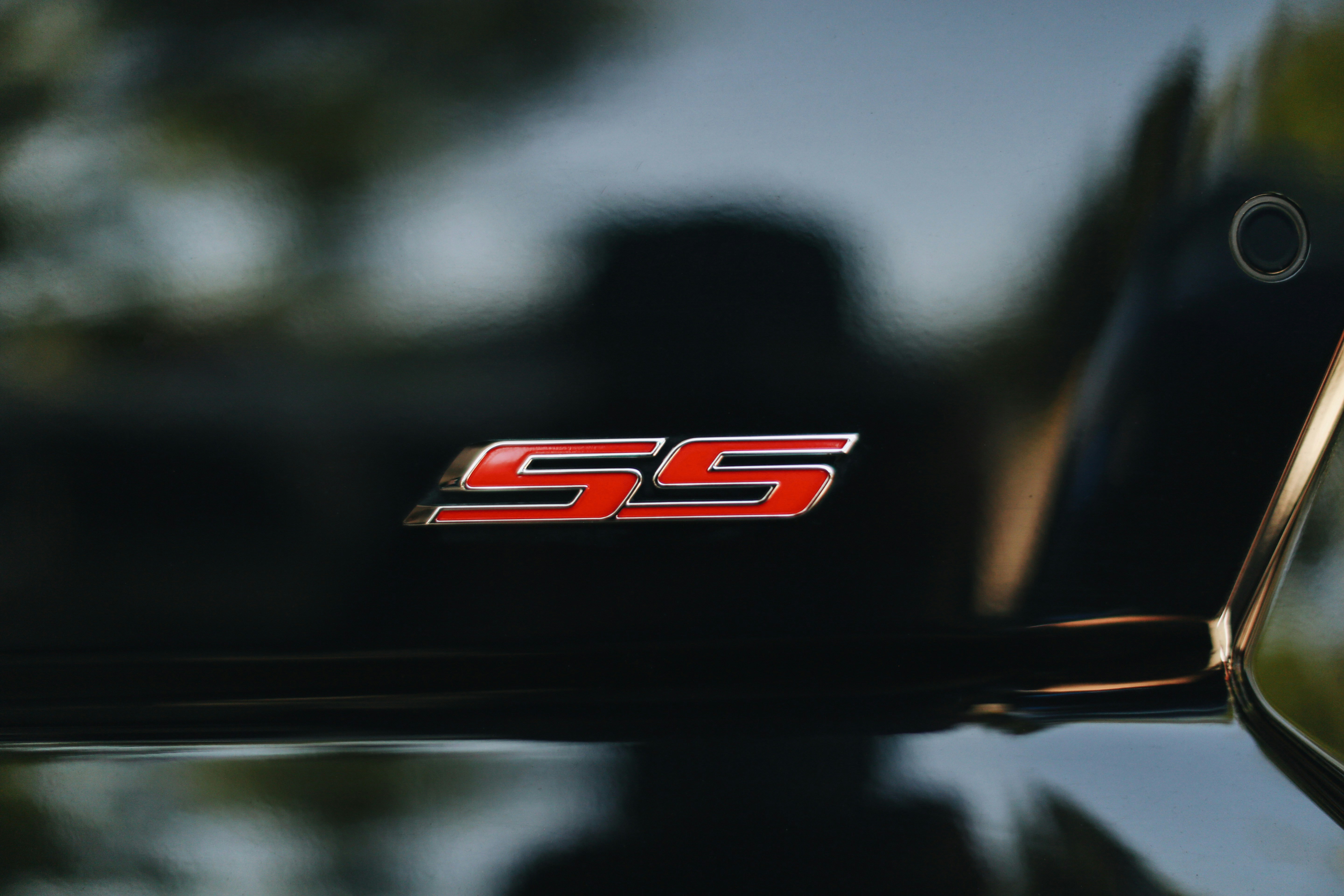 black and red b logo