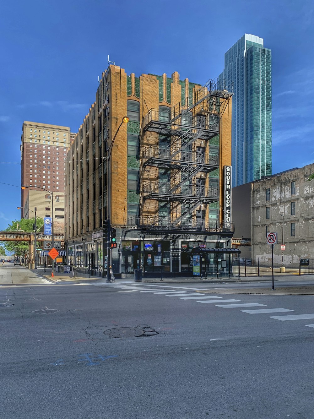 brown concrete building near road during daytime