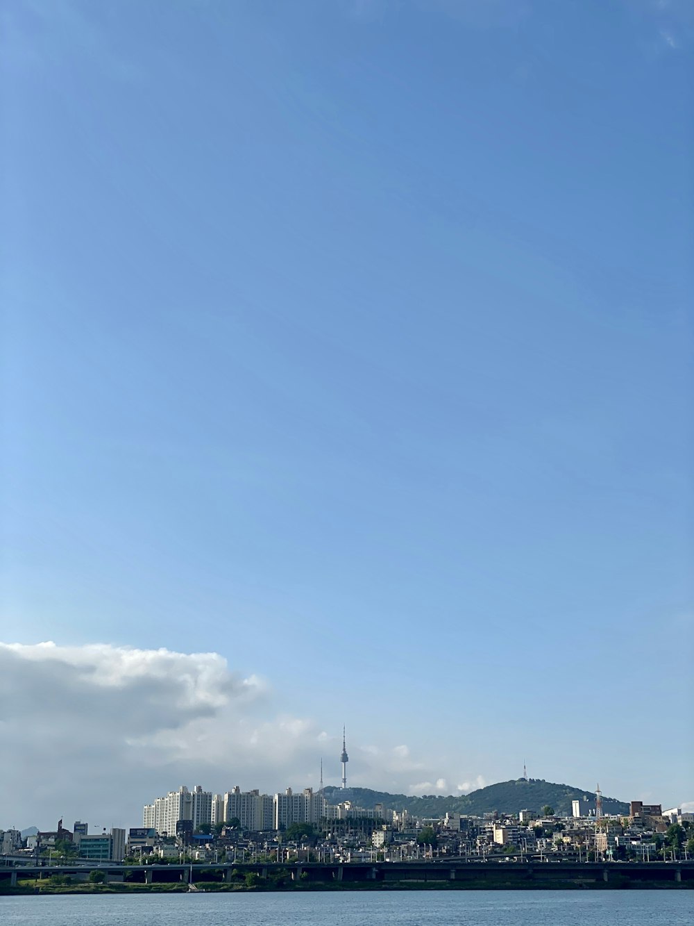 white and blue sky over city