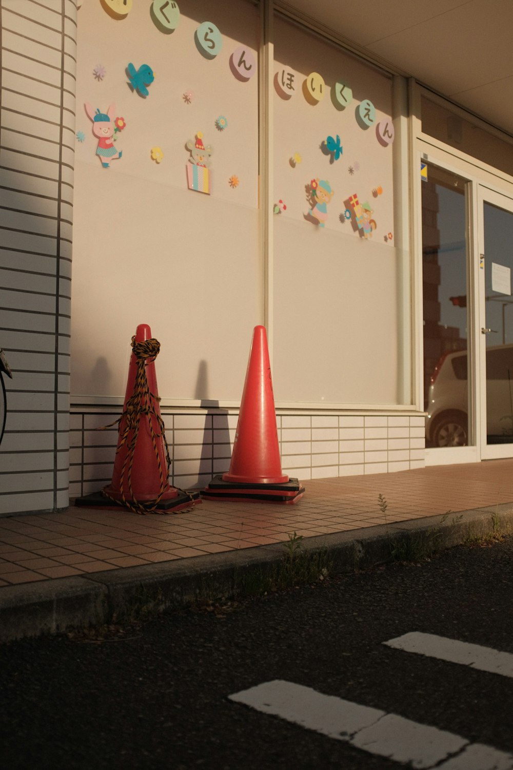 red christmas tree near white wooden door