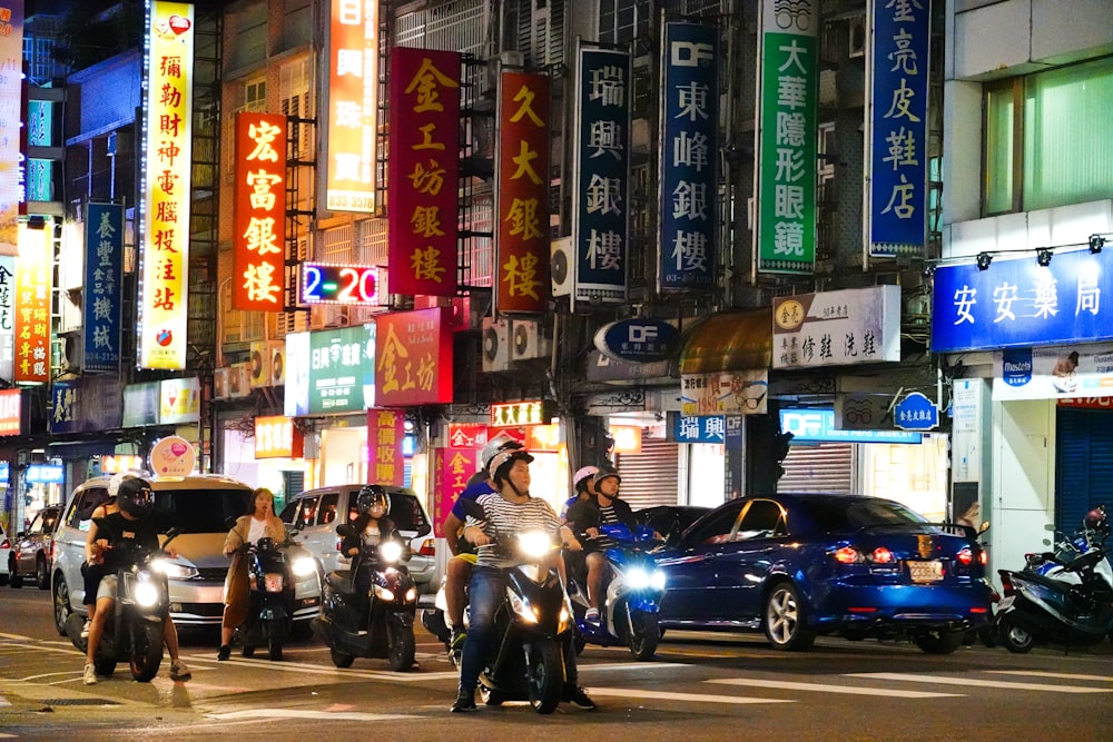 people in black and white cars on road during daytime