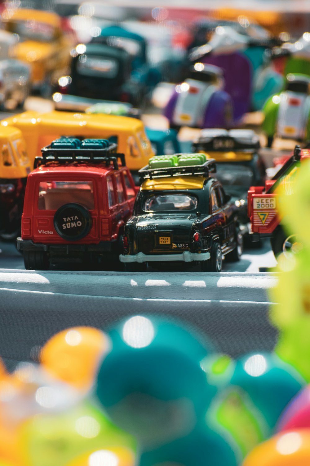 red and yellow car scale model