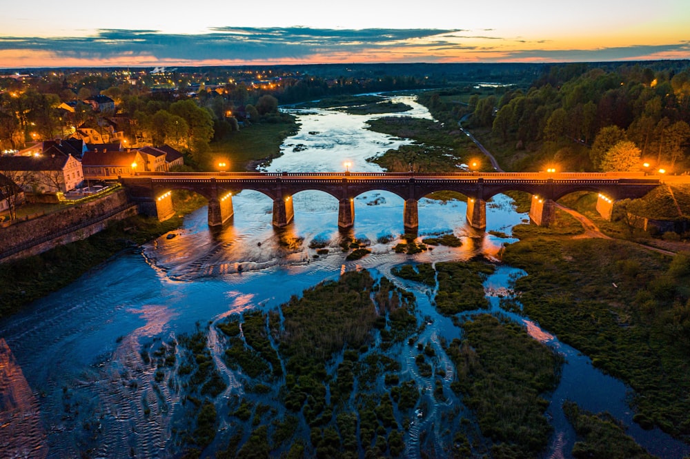 brown bridge over river during daytime