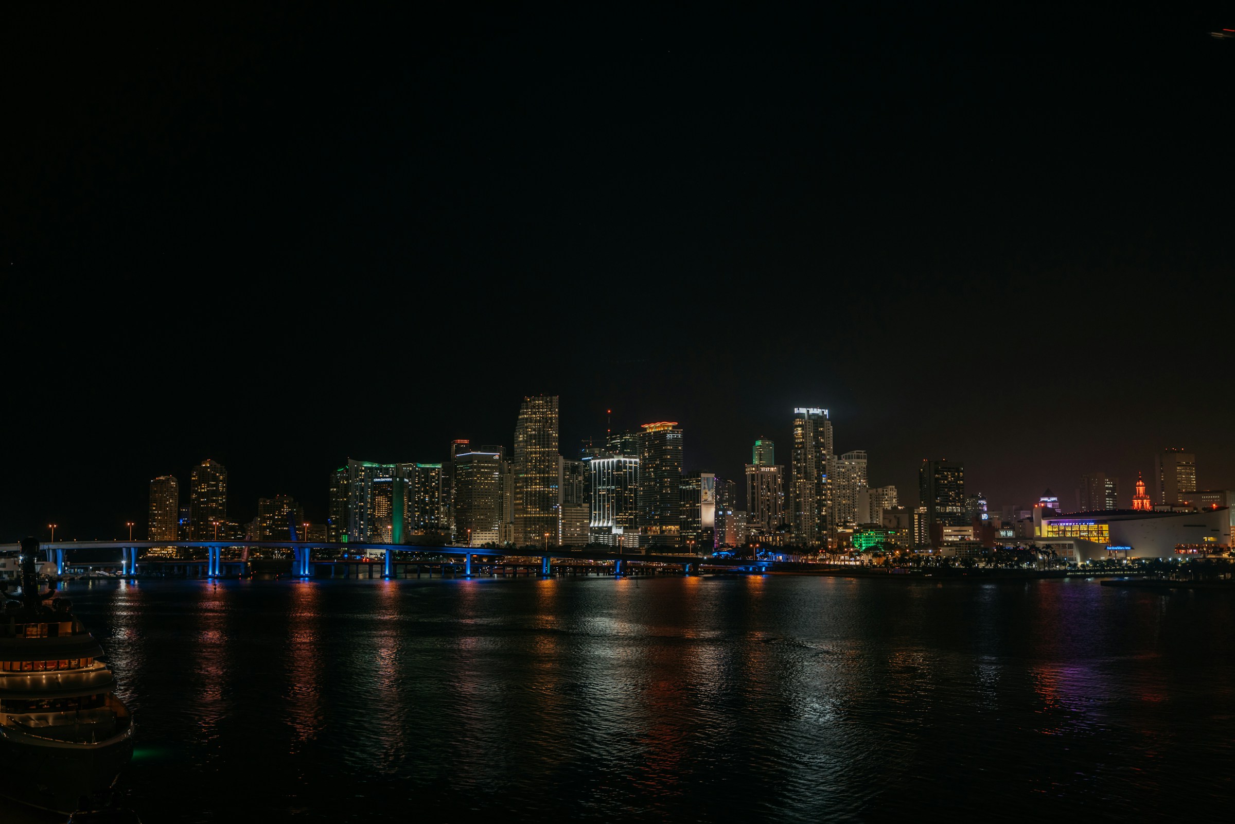 Miami skyline at night over Biscayne Bay