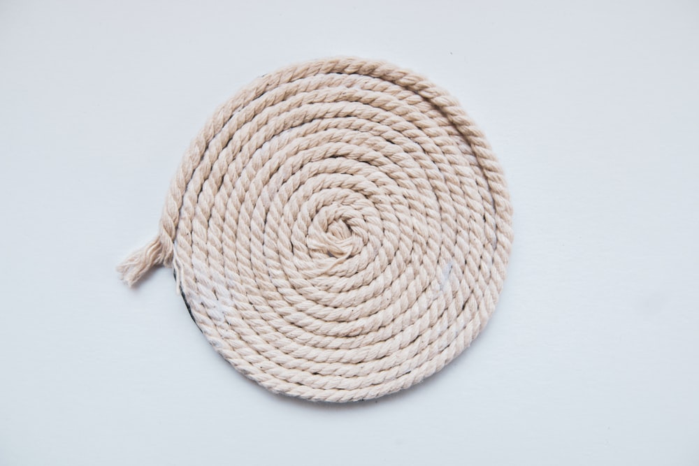 brown rope on white surface