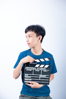 man in blue crew neck t-shirt