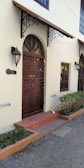 A decorative door awning enhancing the entrance of a home.