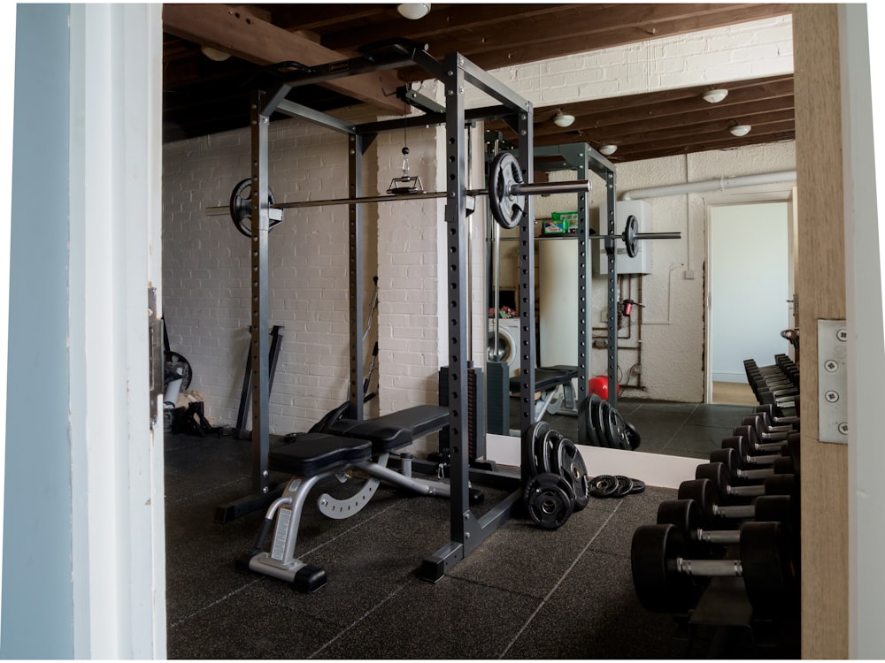 black and gray exercise equipments