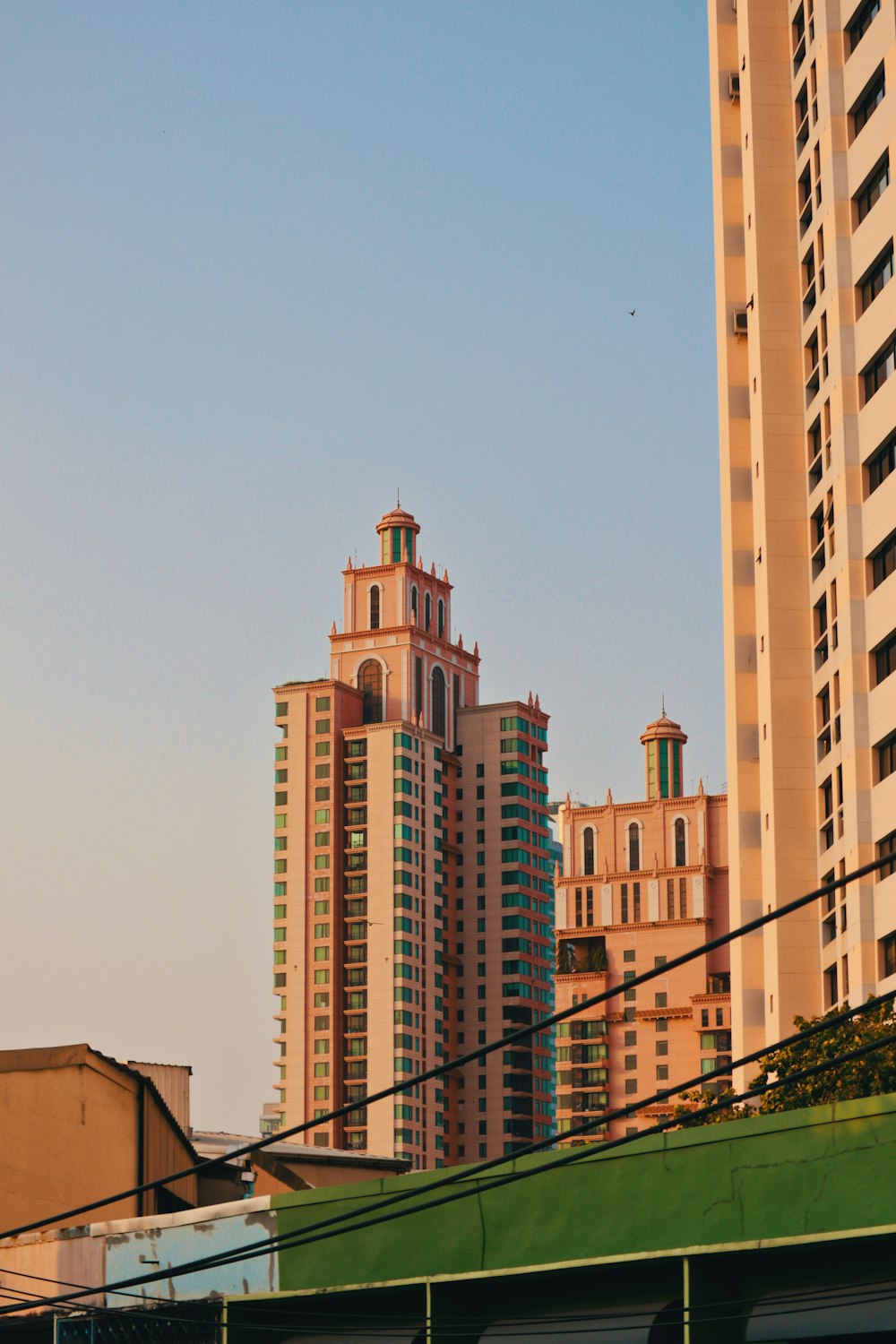 brown concrete building under blue sky during daytime