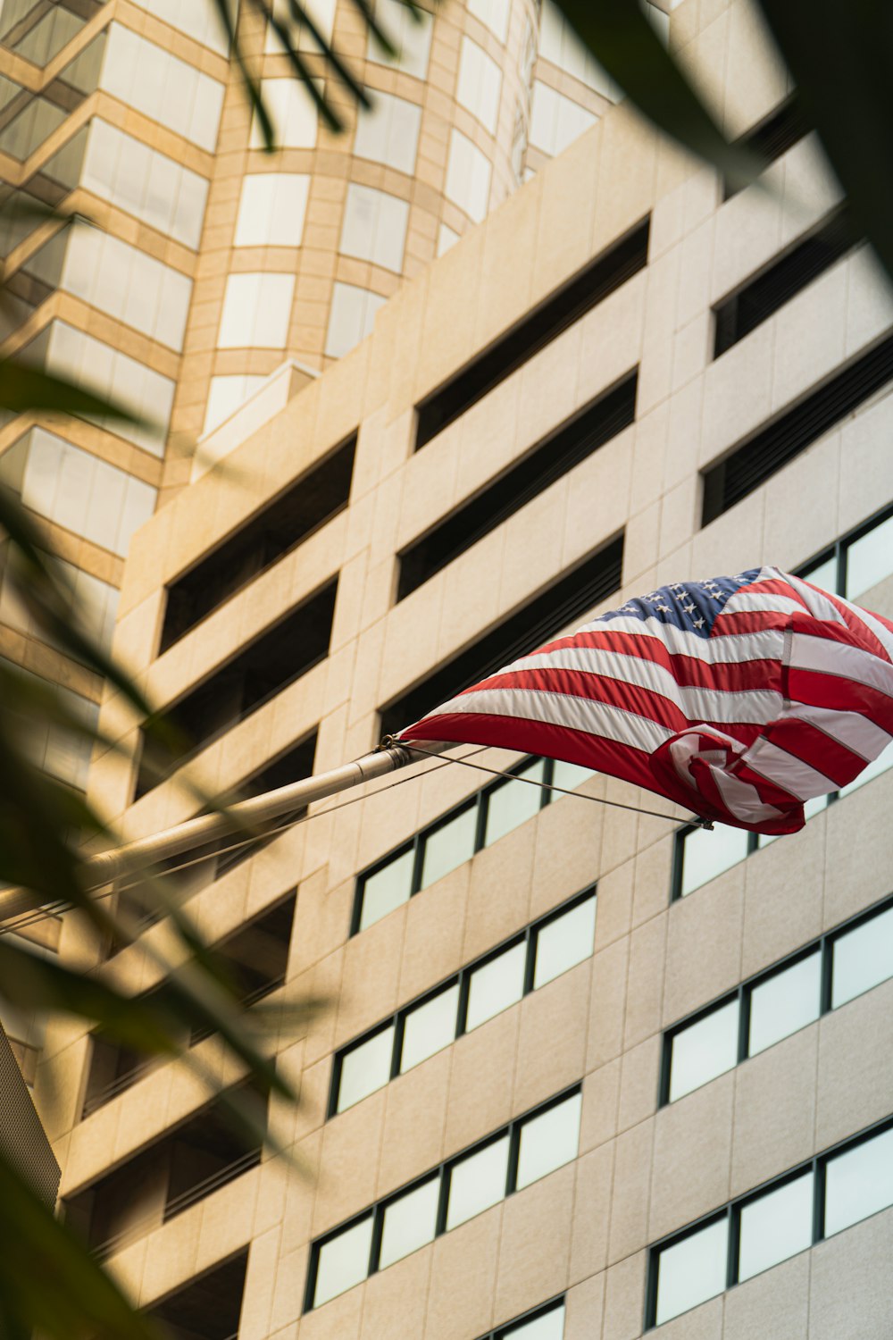 us a flag on brown concrete building