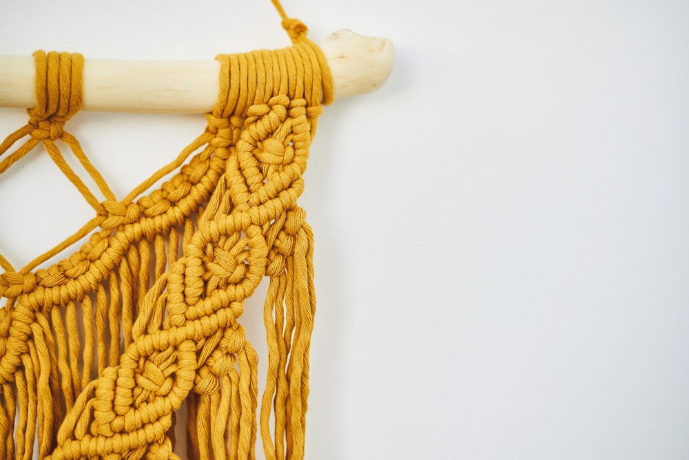 yellow rope on white table