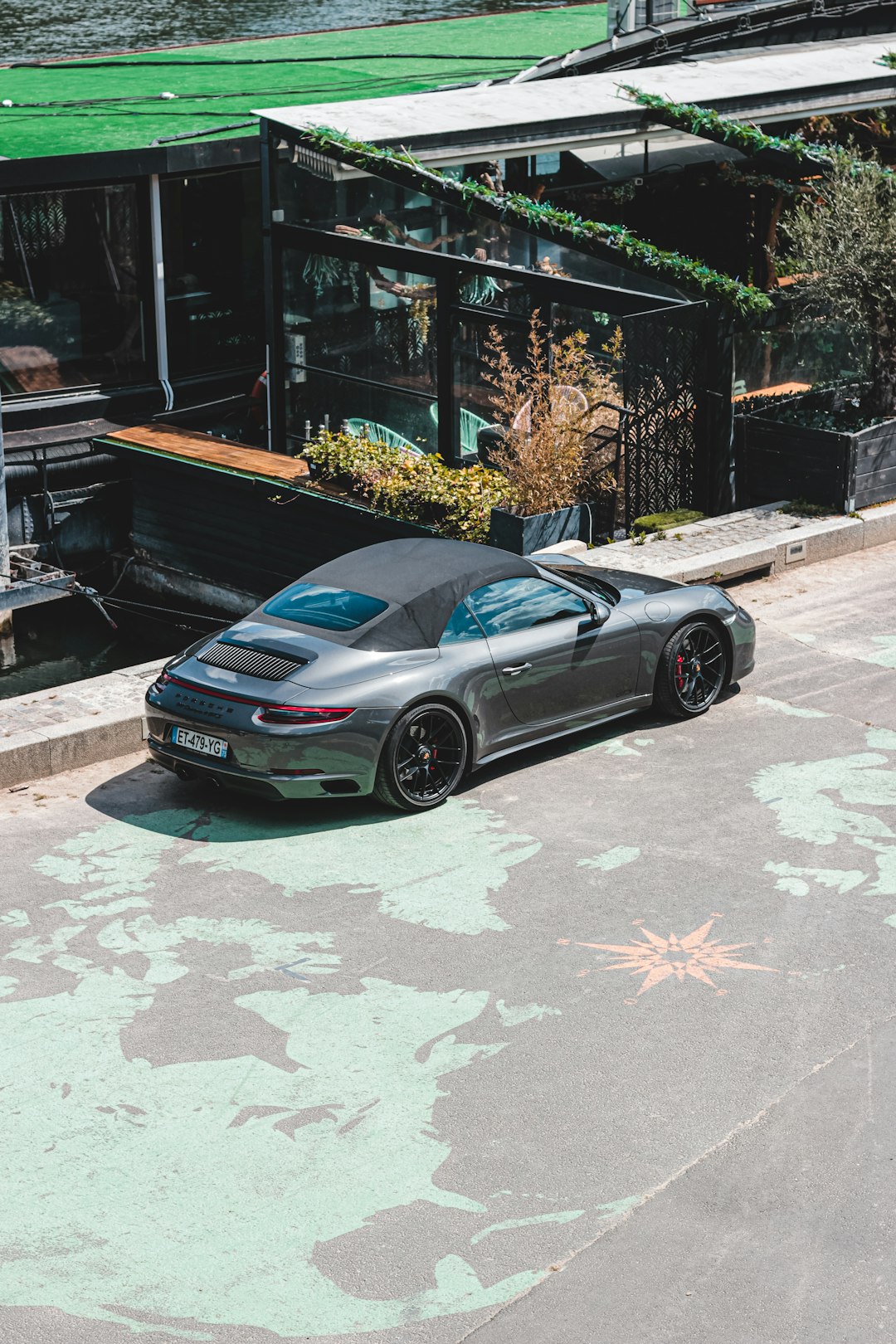 black bmw m 3 parked on sidewalk during daytime