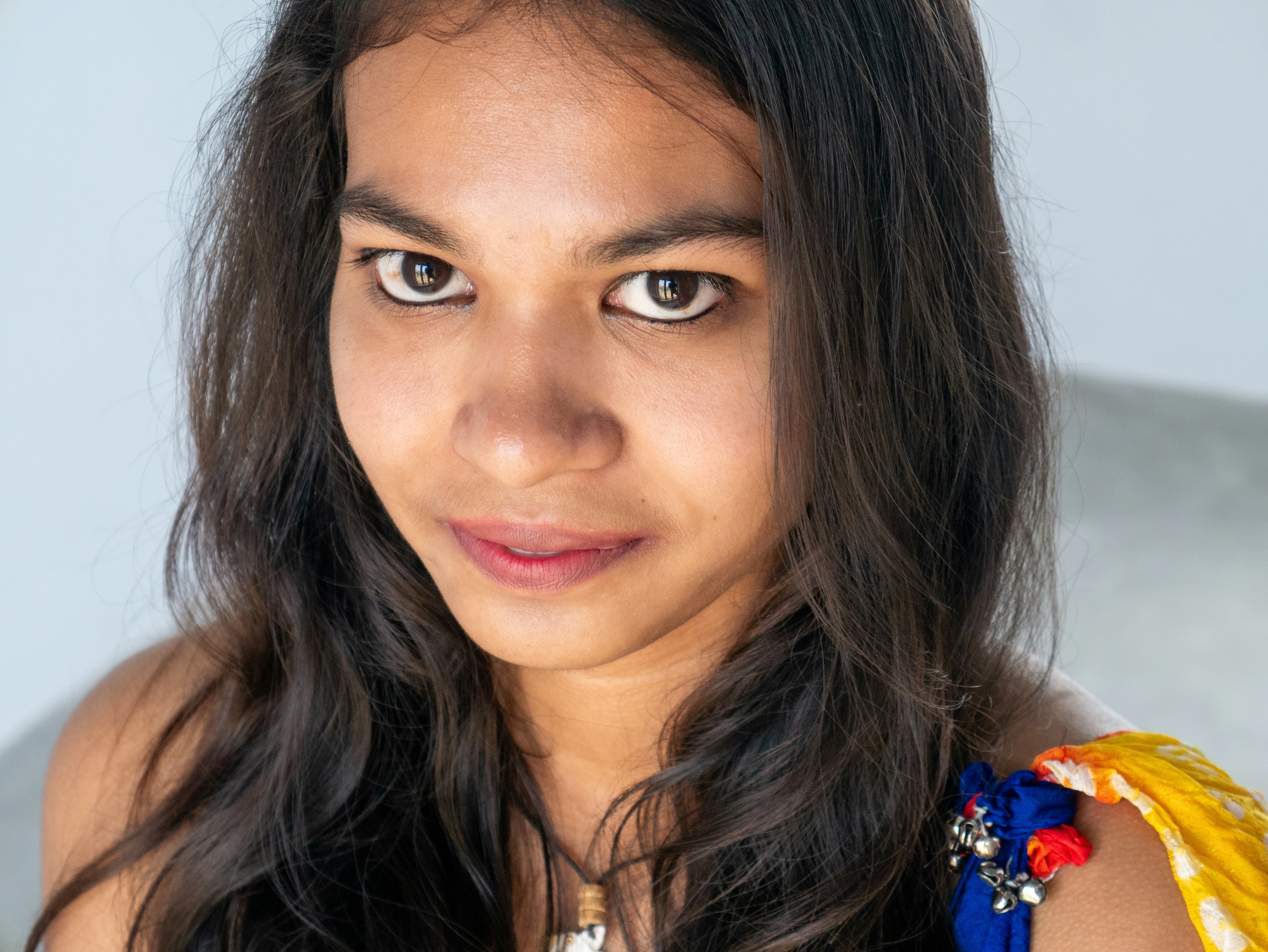 a close up of a person with long hair