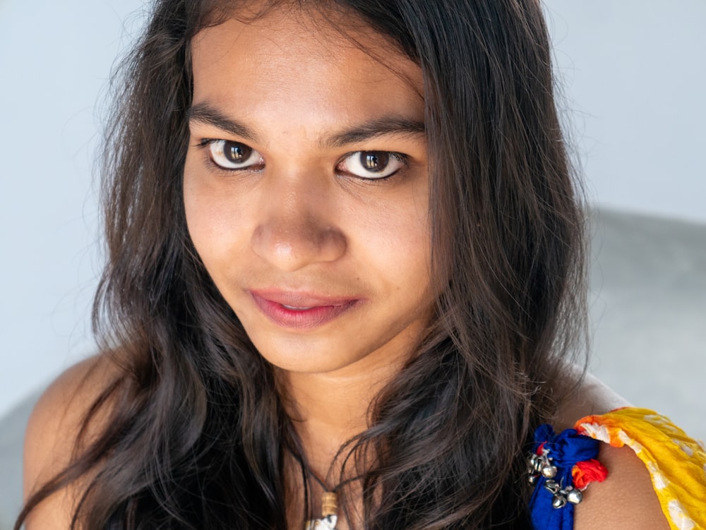 a close up of a person with long hair