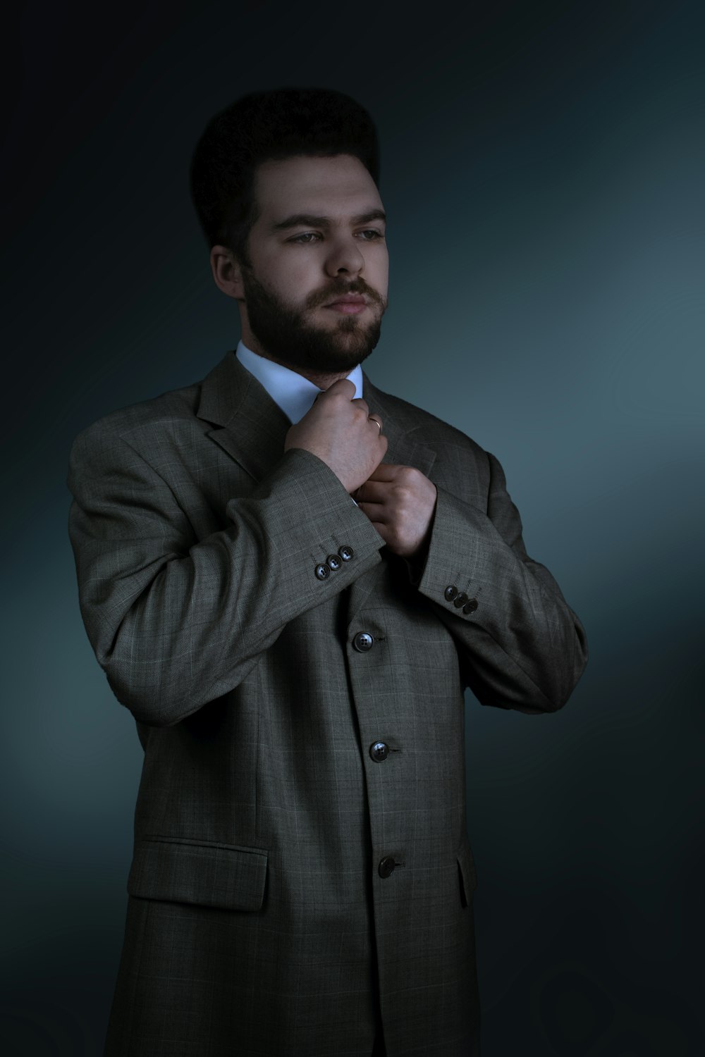 man in gray suit jacket