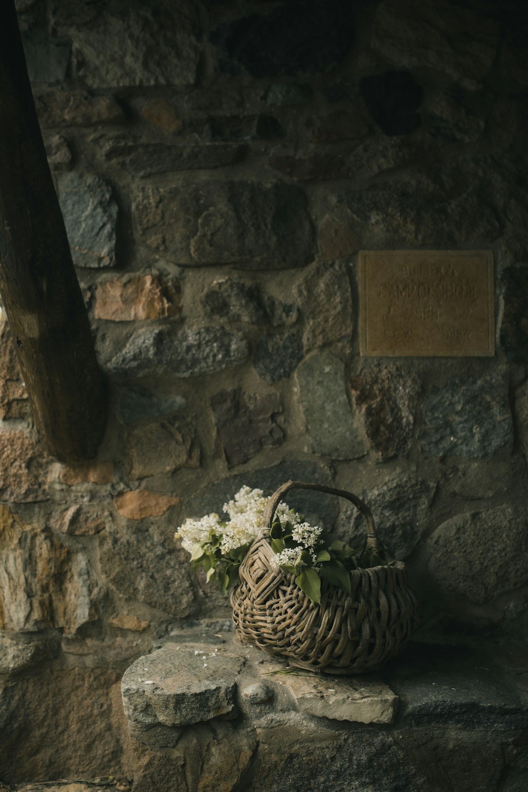 brown woven basket on brown concrete wall