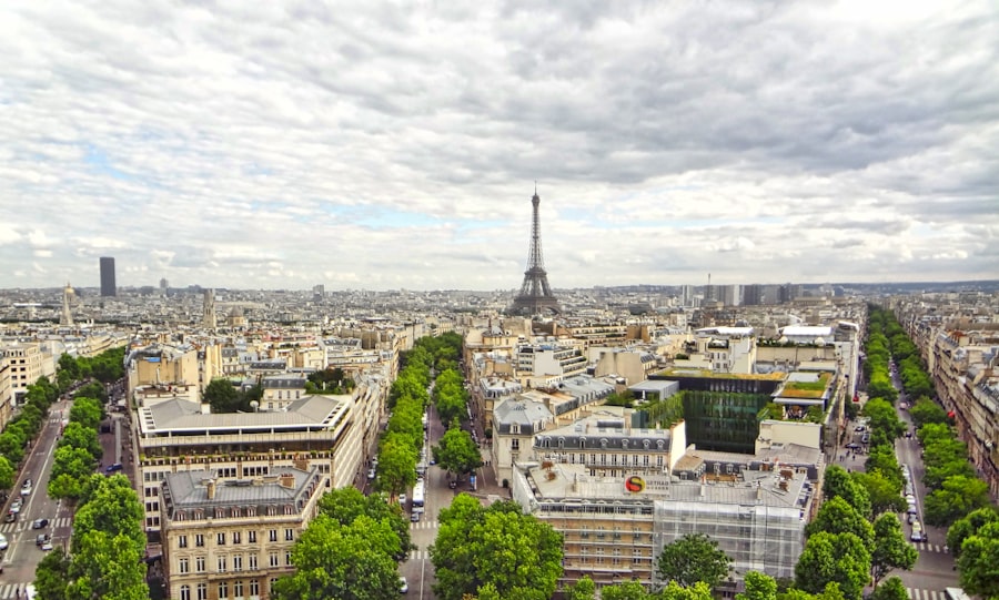 Aerial view of Paris at golden hour showing the Seine winding through the city