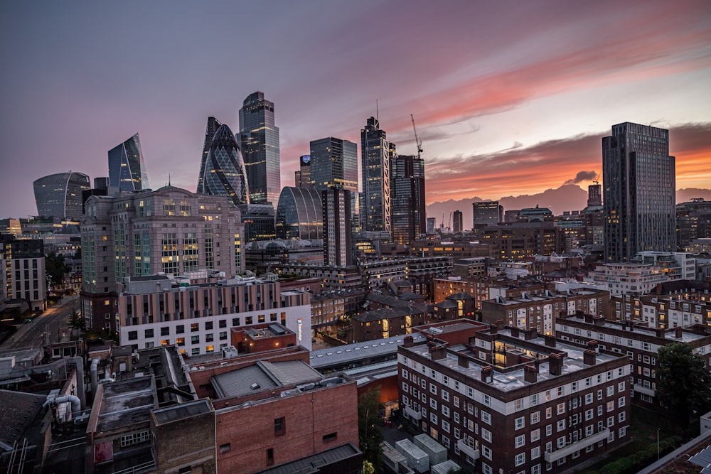 high rise buildings during sunset