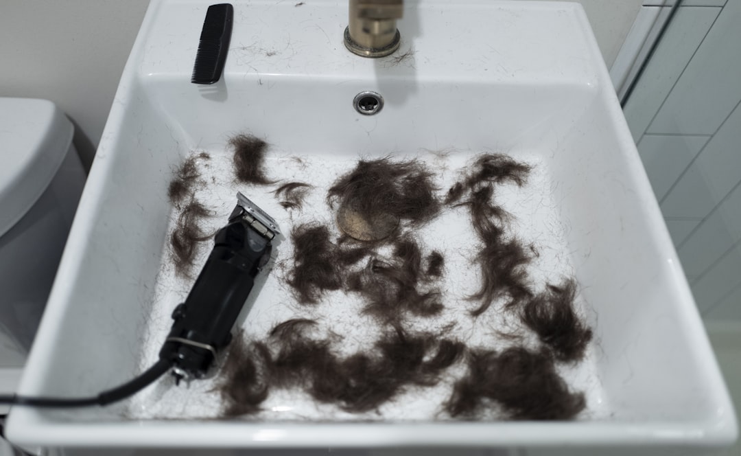 black disposable lighter beside brown and white textile, DIY Haircut