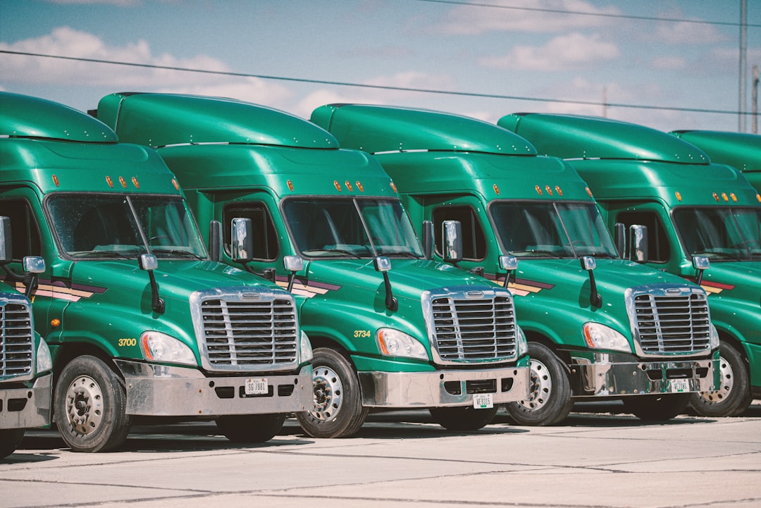 Image of trucks lined up in a parking lot