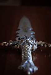 An intricate keris with detailed hilt design.