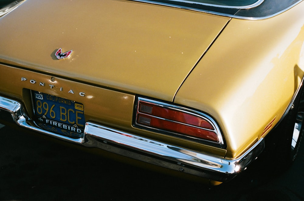 brown mercedes benz car with license plate