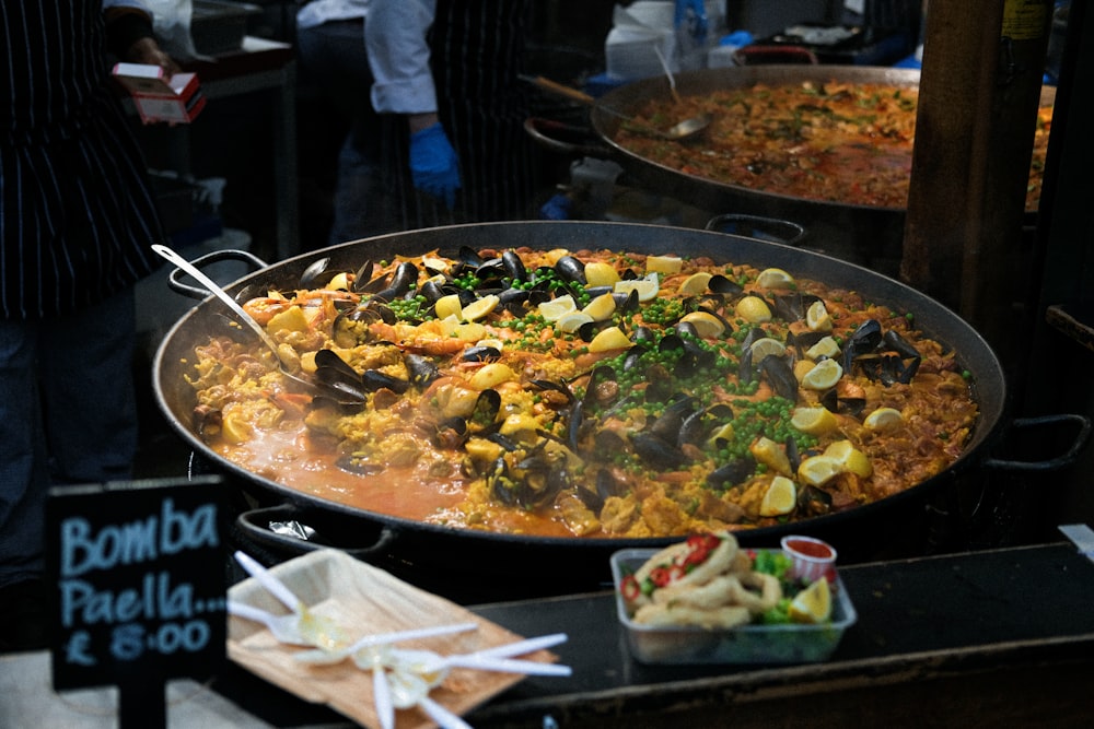 cooked food on black round plate