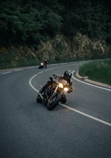 black sports bike on road during daytime