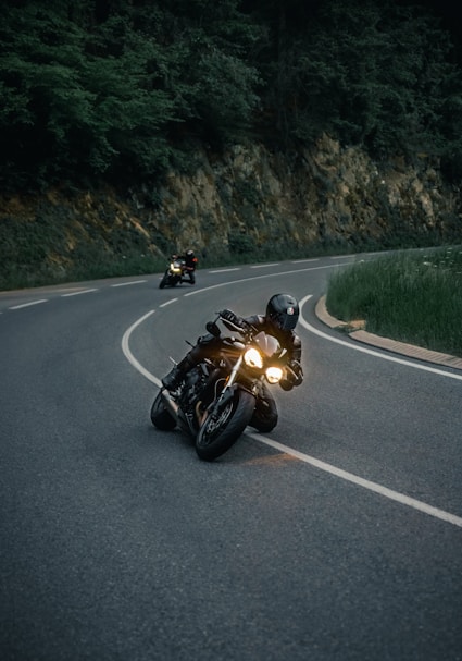 black sports bike on road during daytime