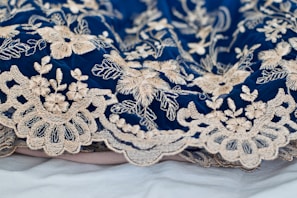 blue and white floral textile