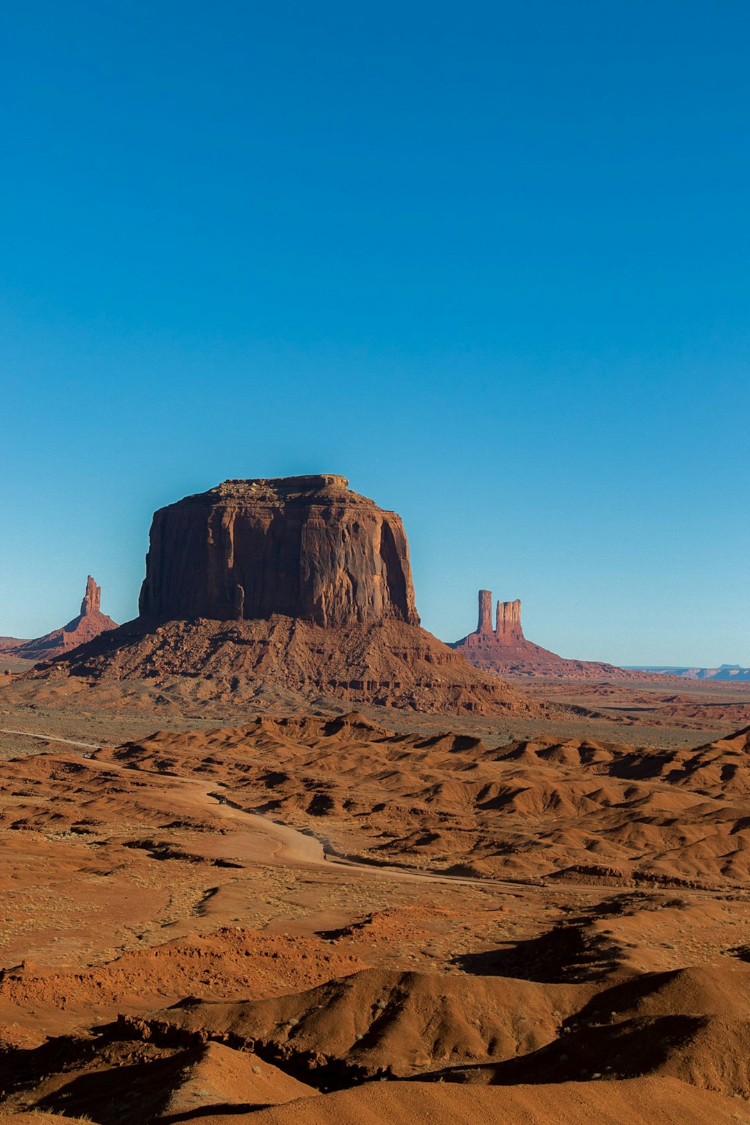 brown rock formation under blue sky during daytime