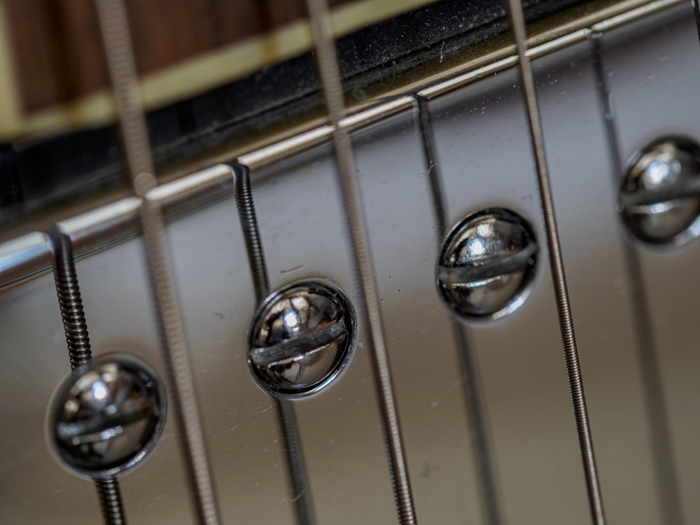 brown and silver guitar head stock