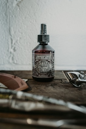 jack daniels bottle on brown wooden table
