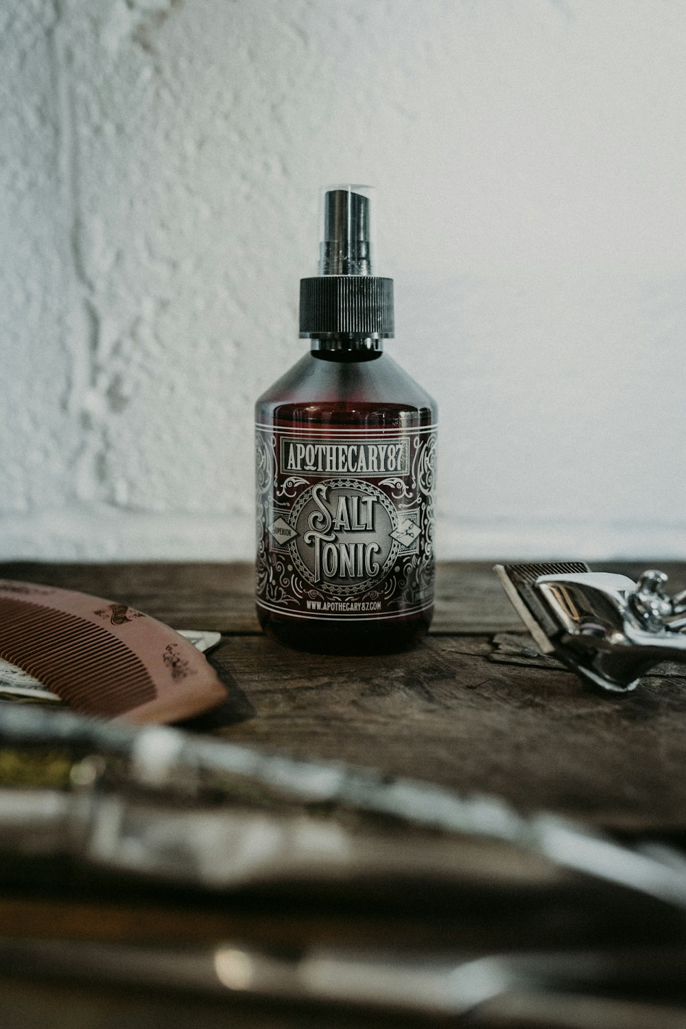 jack daniels bottle on brown wooden table